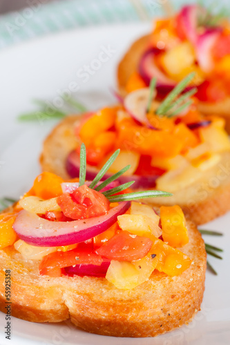 Bruschetta with fresh tomatoes and red onion