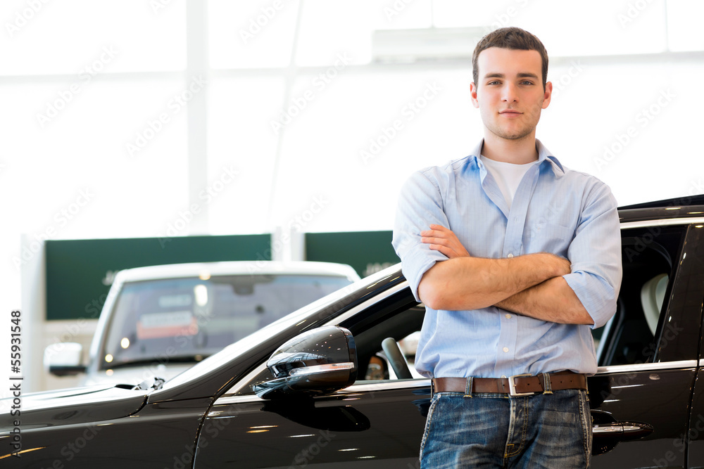 man standing near a car man standing near a car