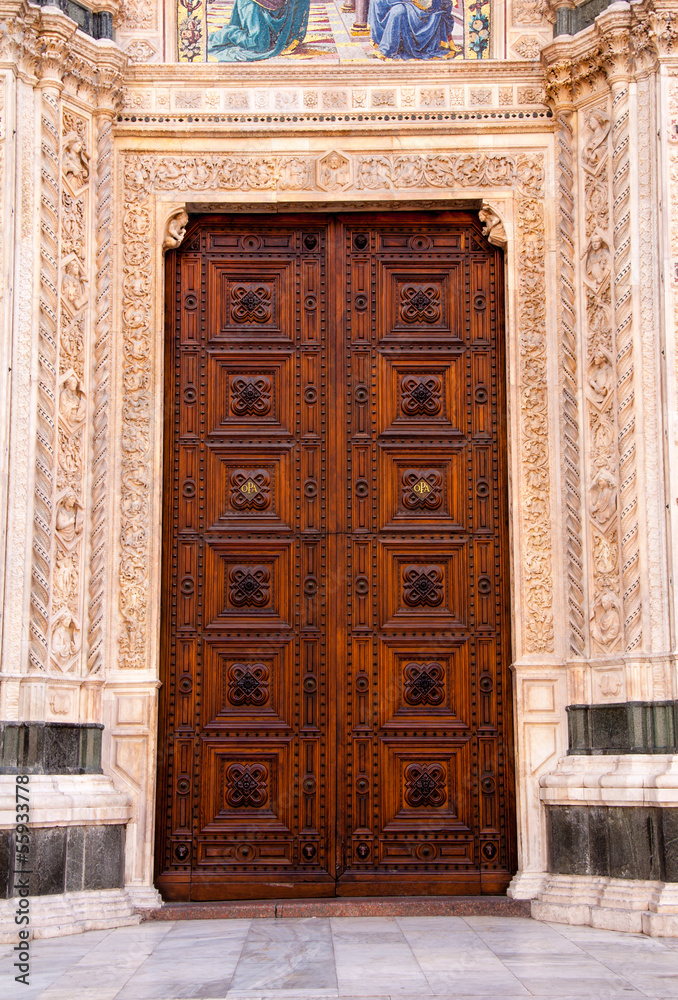 wooden church door with delicate ornaments wooden church door with delicate ornaments
