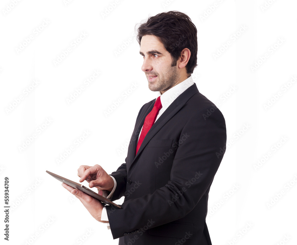 Handsome smiling businessman with tablet computer. Isolated over Handsome smiling businessman with tablet computer. Isolated over