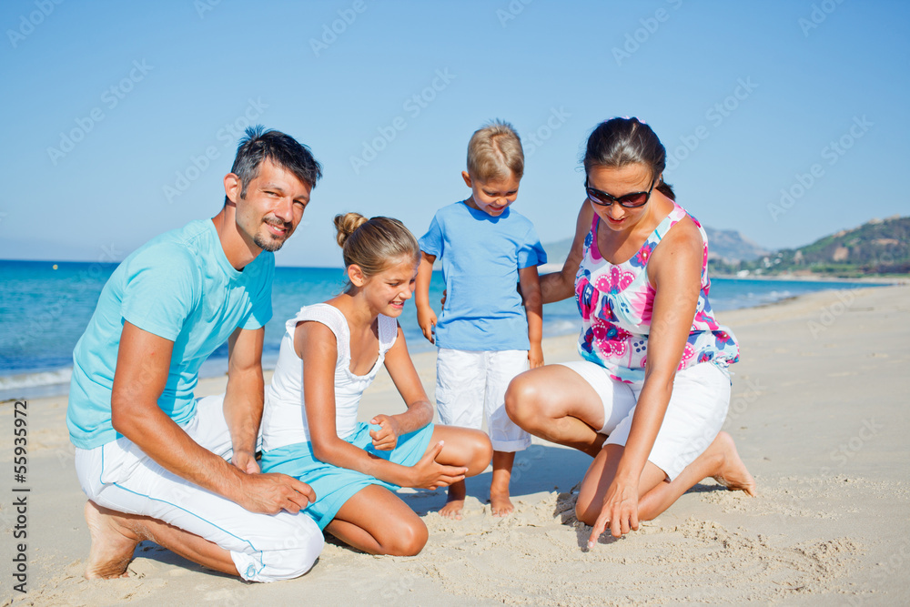 family having fun on beach family having fun on beach