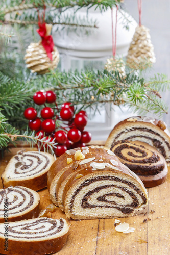 Poppy seed cake in christmas setting. Selective focus