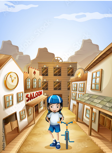 A girl standing in the middle of the saloon bars with her bike