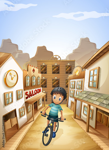A boy biking in the middle of the saloon bars