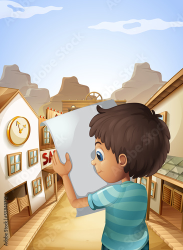 A boy holding an empty piece of paper
