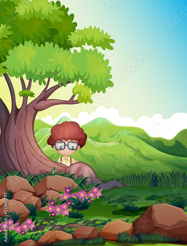 A scared young boy hiding