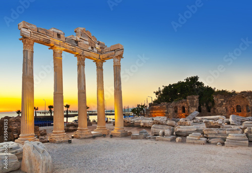 Old ruins in Side, Turkey at sunset photo