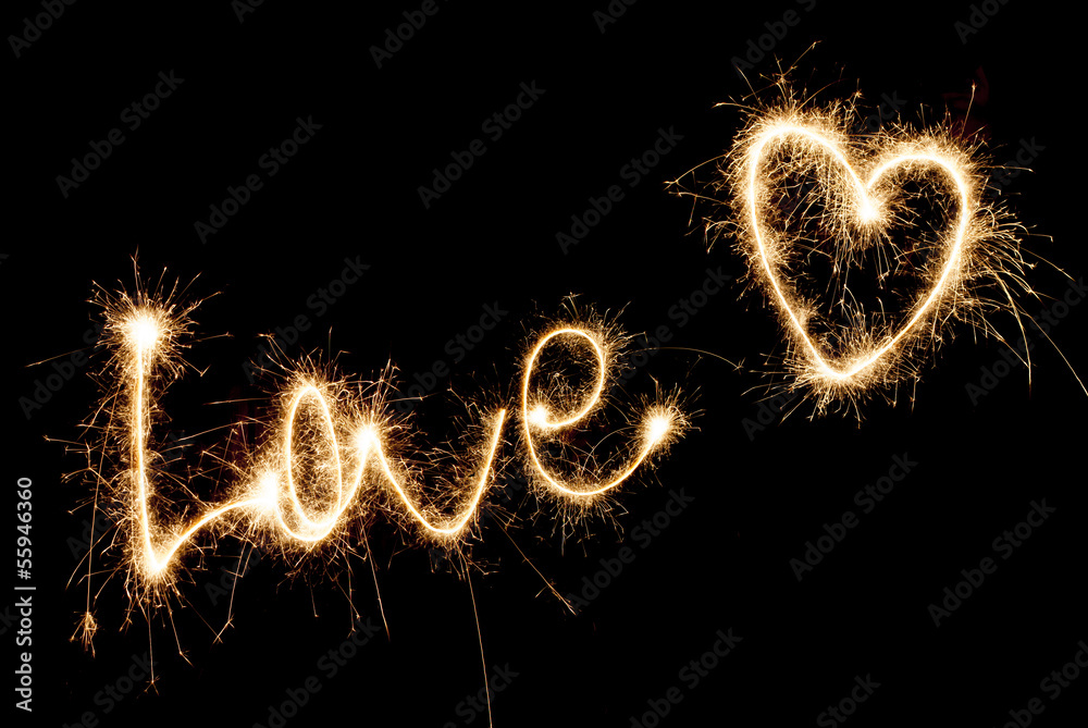 Inscription Love and heart of sparklers.