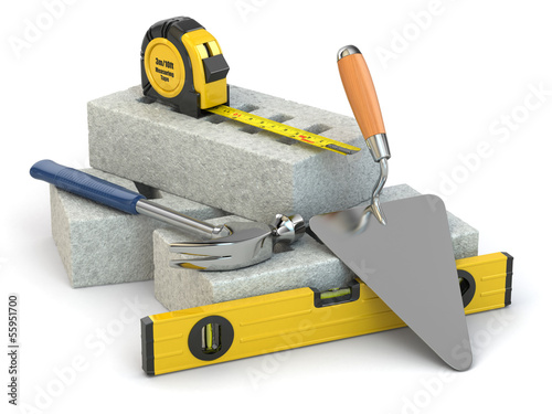 Fototapeta Naklejka Na Ścianę i Meble -  Construction concept. Bricks, trowel, hammer and level.