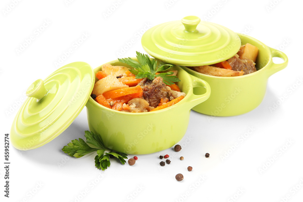 Homemade beef stir fry with vegetables in color pans, isolated Homemade beef stir fry with vegetables in color pans, isolated
