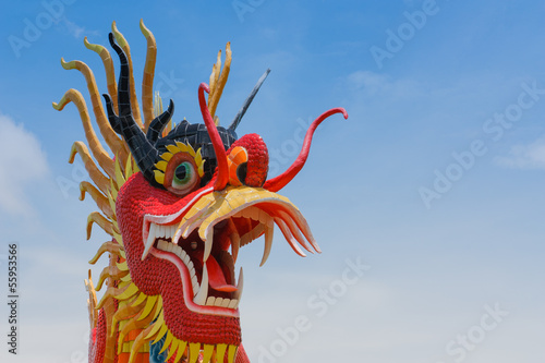 Dragon statue with beautiful clouds and blue sky