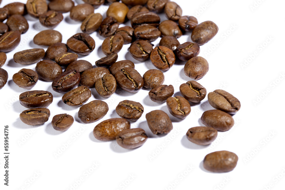 Brown coffee beans isolated on white background Brown coffee beans isolated on white background