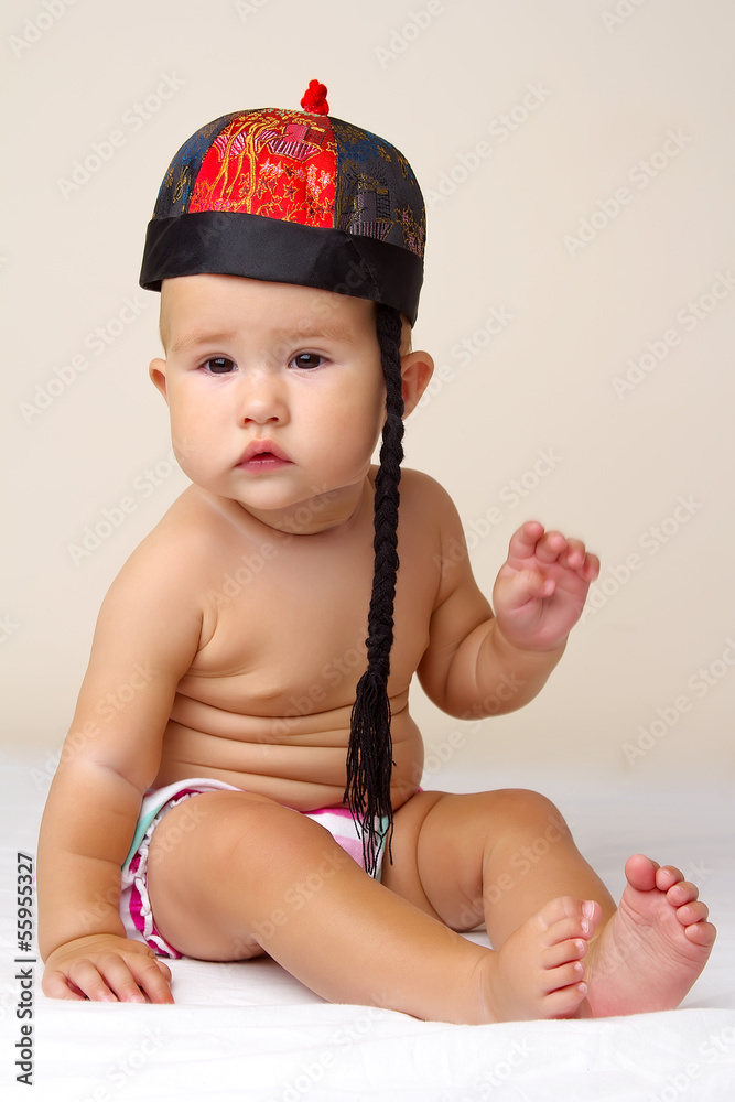 Baby and Chinese New Year Hat. Baby and Chinese New Year Hat.