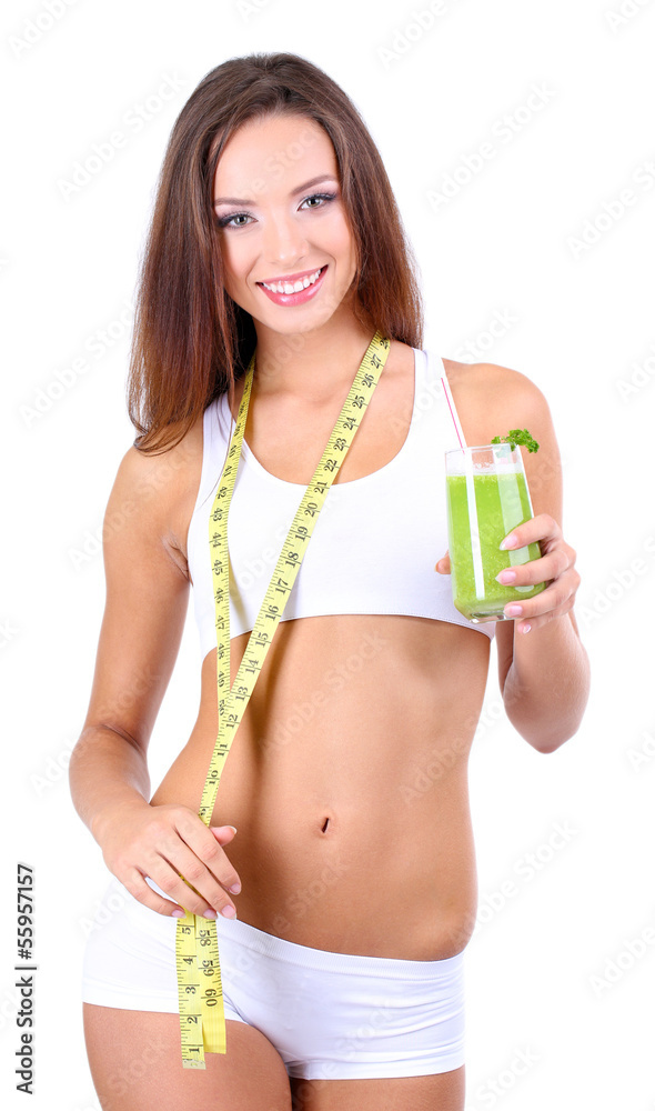 Beautiful girl with fresh juice and measuring tape isolated Beautiful girl with fresh juice and measuring tape isolated
