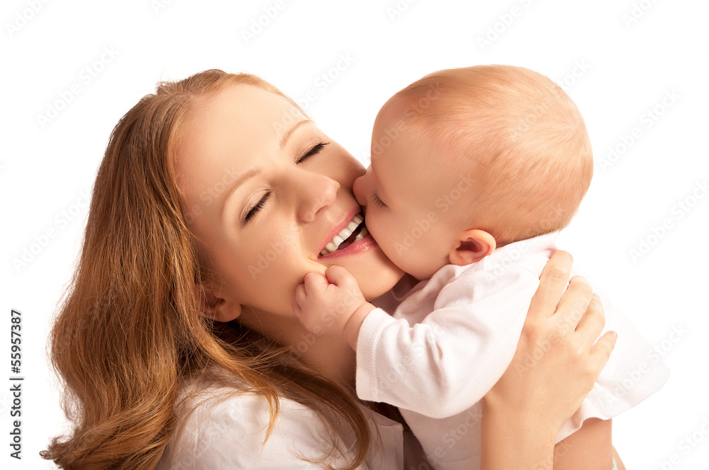 Happy cheerful family. Mother and baby kissing isolated Happy cheerful family. Mother and baby kissing isolated