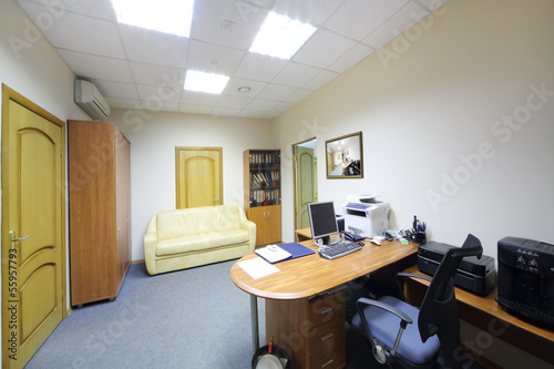 Empty working area in office photo