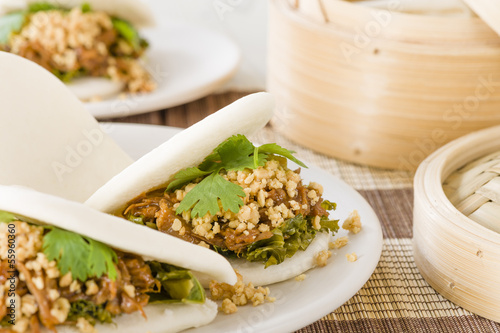 Gua Bao - Taiwanese burger with braised pork and peanuts. photo