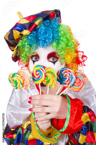 Clown with lollipops isolated on white