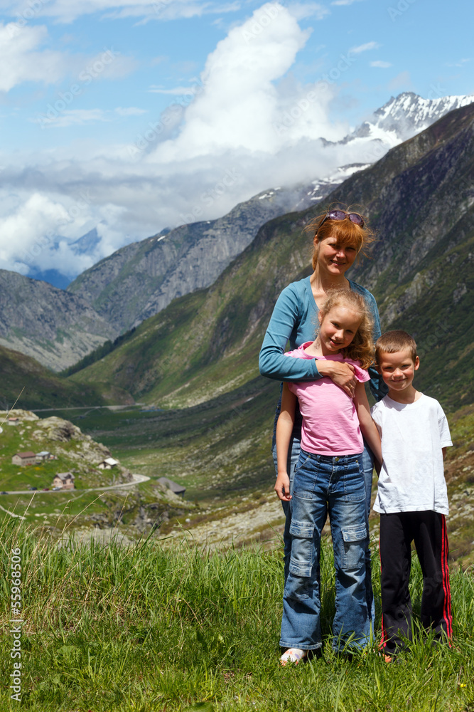 Family  on summer Alps mountain
