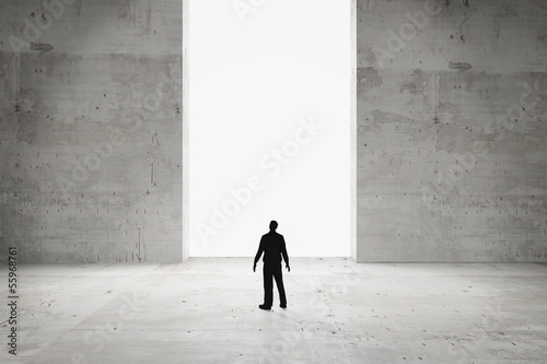 Concept with concrete and black silouette man