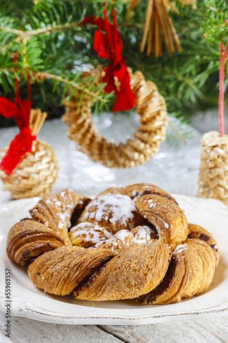 Festive braided bread on wooden table