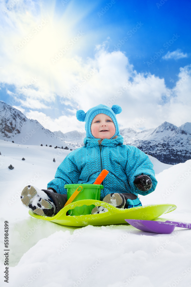 Toddler boy and sledge Toddler boy and sledge