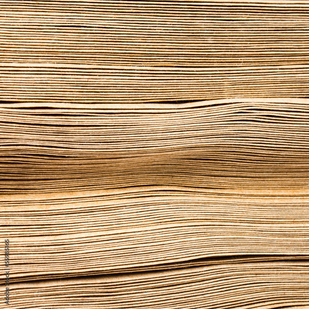 Side View Of Huge Stack of Recycled Paper envelopes close up. Bu Side View Of Huge Stack of Recycled Paper envelopes close up. Bu