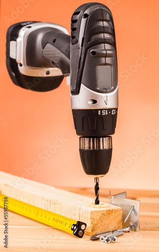 Foto drill and wood mounting tools