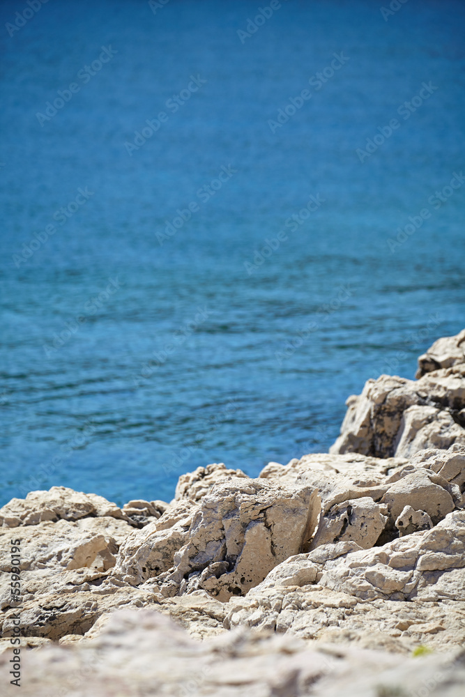 Rocks , sea and blue sky, background for cover Rocks , sea and blue sky, background for cover