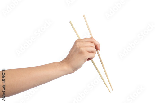 Woman hand using a chopsticks