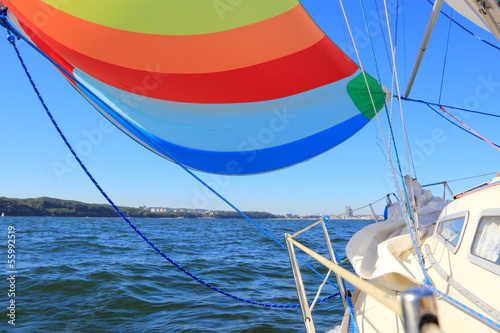 Bilde på lerret The wind has filled colorful spinnaker sail