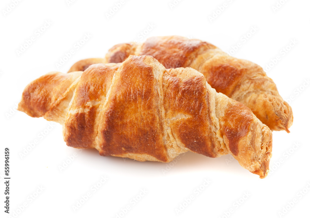 Croissants close-up isolated on white background Croissants close-up isolated on white background