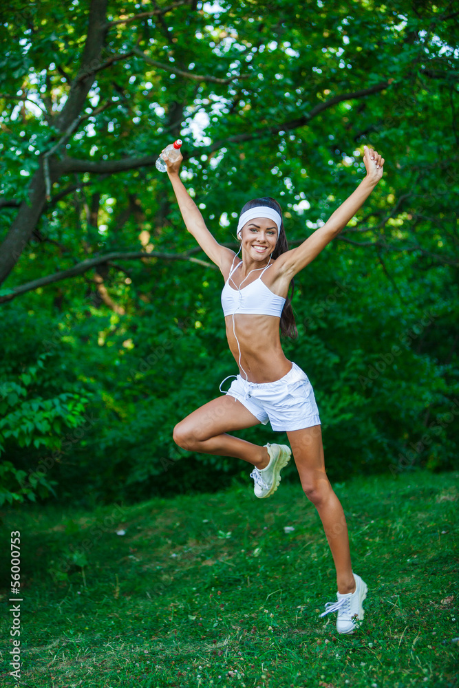 young beautiful brunette sportswoman outdoor young beautiful brunette sportswoman outdoor