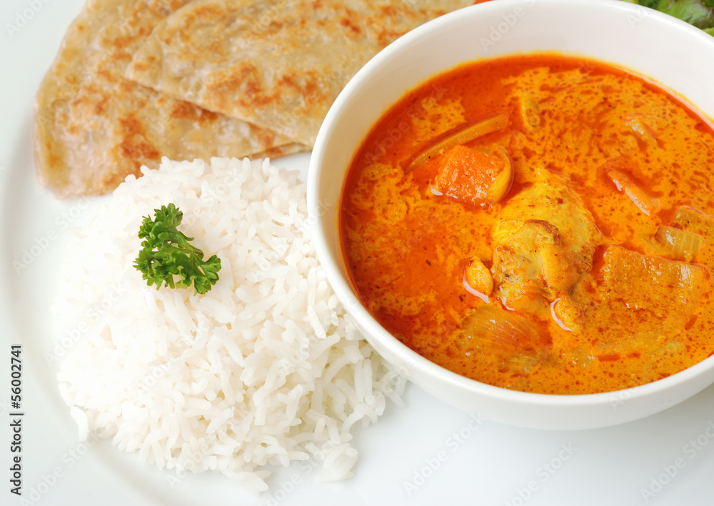 Chicken curry with rice and roti Chicken curry with rice and roti