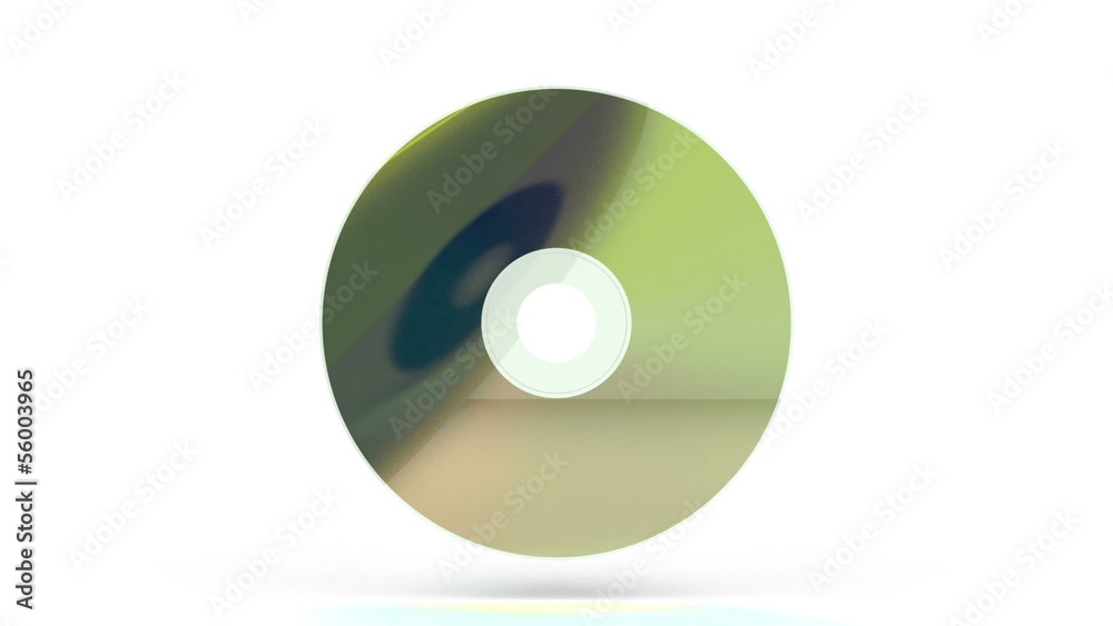 Compact disc rotates on white background