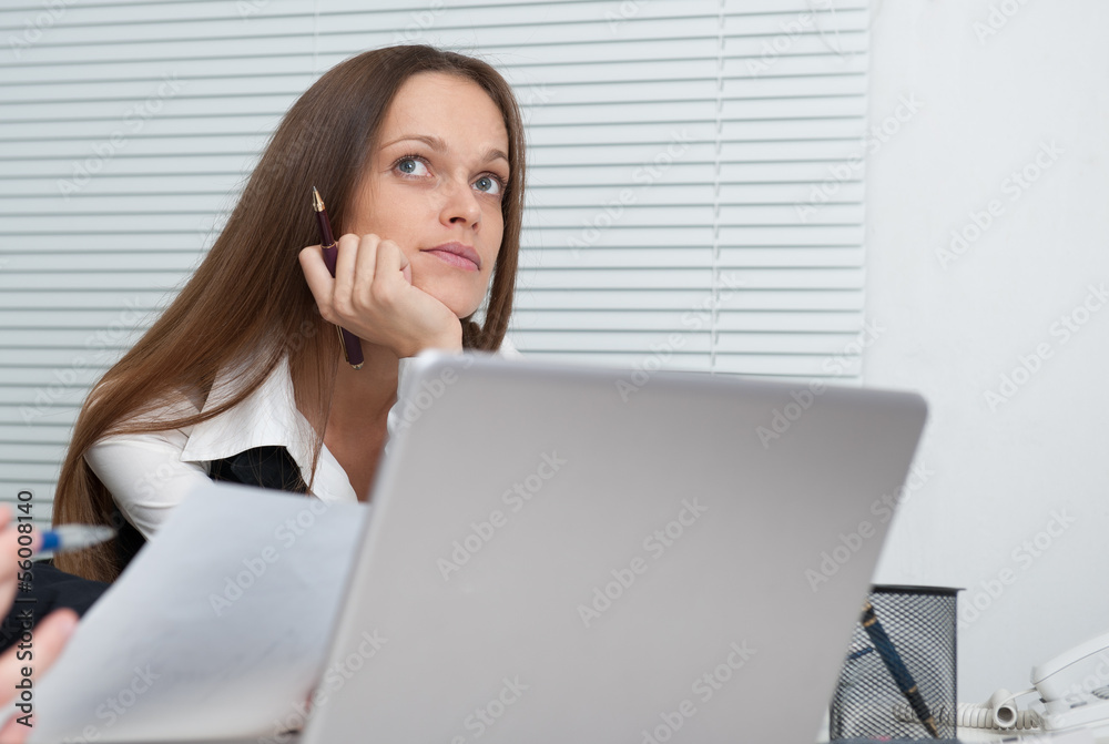 Portrait of businesswoman daydreaming inside the office Portrait of businesswoman daydreaming inside the office