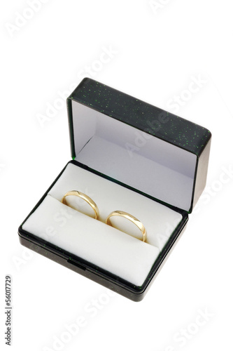 Gold rings in box isolated on white