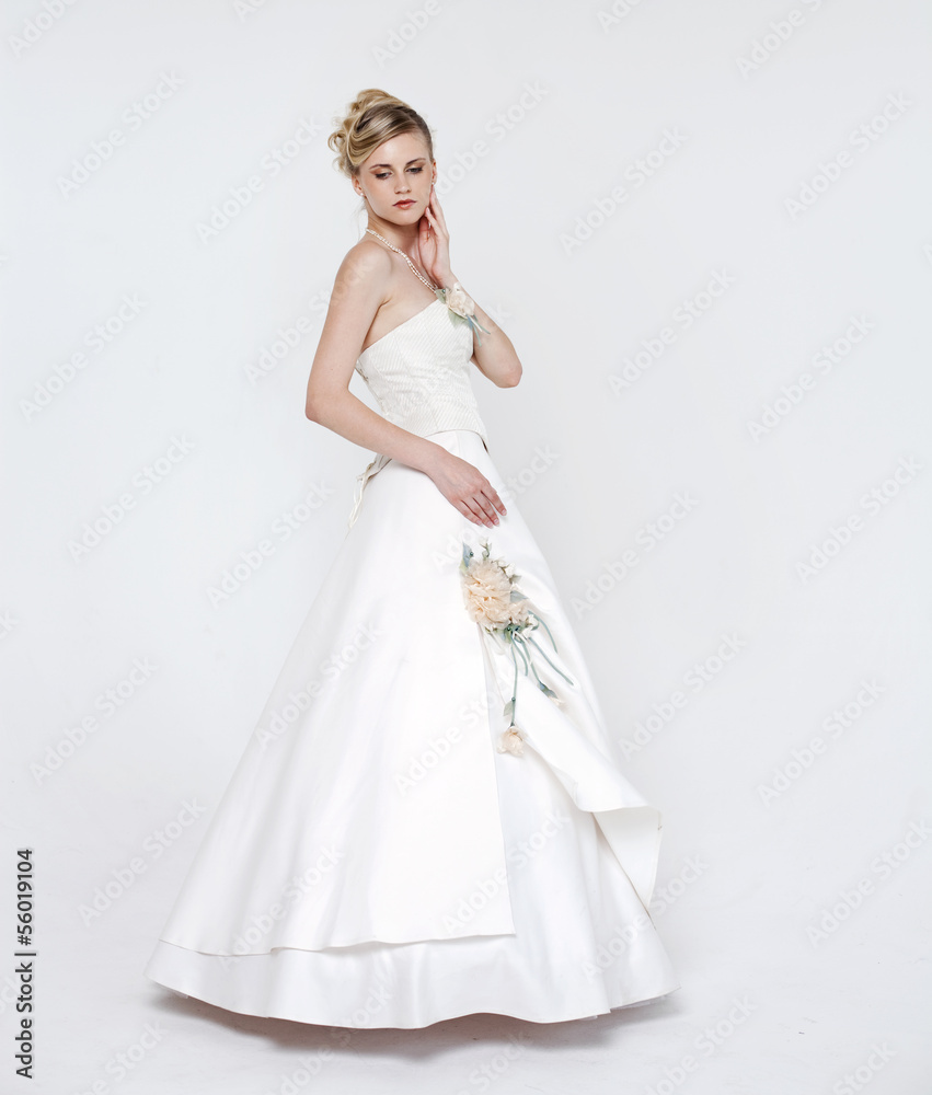 Beautiful blonde bride wearing wedding dress