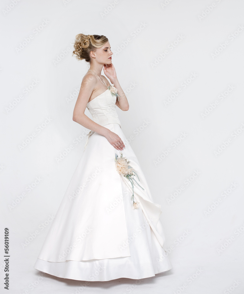 Fototapeta premium Beautiful blonde bride wearing wedding dress