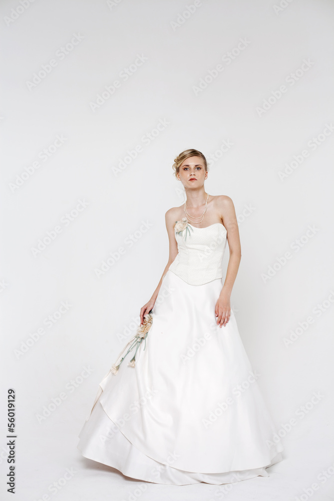 Beautiful blonde bride wearing wedding dress Beautiful blonde bride wearing wedding dress