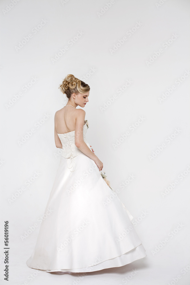 Beautiful blonde bride wearing wedding dress Beautiful blonde bride wearing wedding dress
