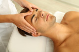 Man having head massage close up