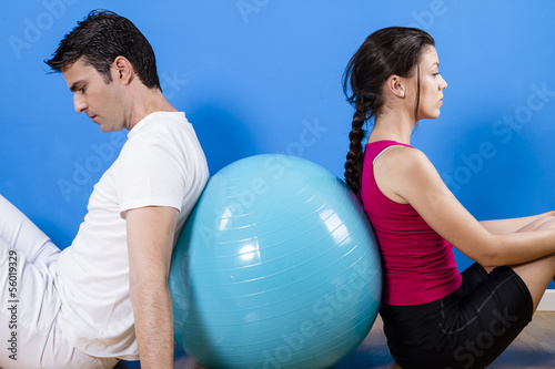 Beautiful athletic couple with fitness ball. © Fernando Cortés