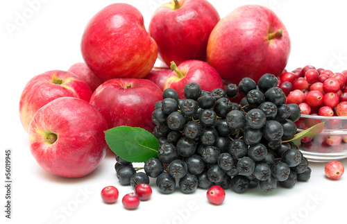 chokeberry, apples and cranberries close-up. white background.