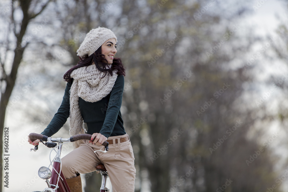 Young woman with a bicycle