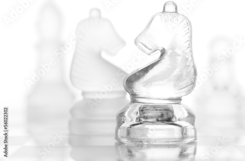 glass chess pieces isolated on white