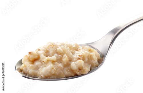 Spoon of oats porridge