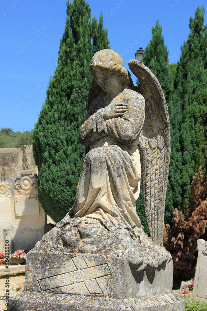Angel statue at a French cemetary Angel statue at a French cemetary