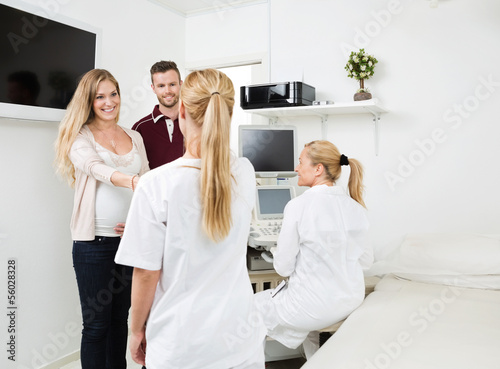 Couple Visiting Gynecologist For Routine Checkup