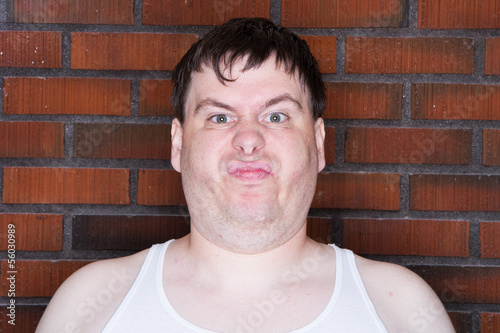 Man making a goofy face to the camera
